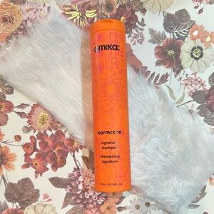 amika Bright Orange Normcore Signature Shampoo Bottle